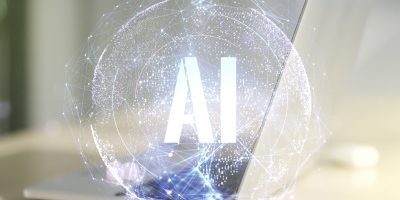 Creative artificial Intelligence symbol concept with modern computer on background. Double exposure