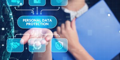 Business, Technology, Internet and network concept. Young businessman working on a virtual screen of the future and sees the inscription: Personal data protection