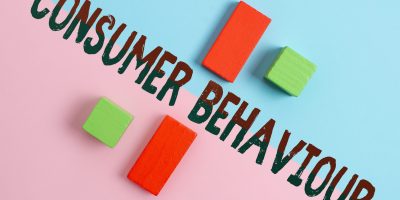 Writing displaying text Consumer Behaviour, Business idea Decisions that showing make to buy or not to buy a product Two Objects Arranged Facing Inward Outward On a Separated Coloured Background