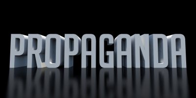 Propaganda word on black background